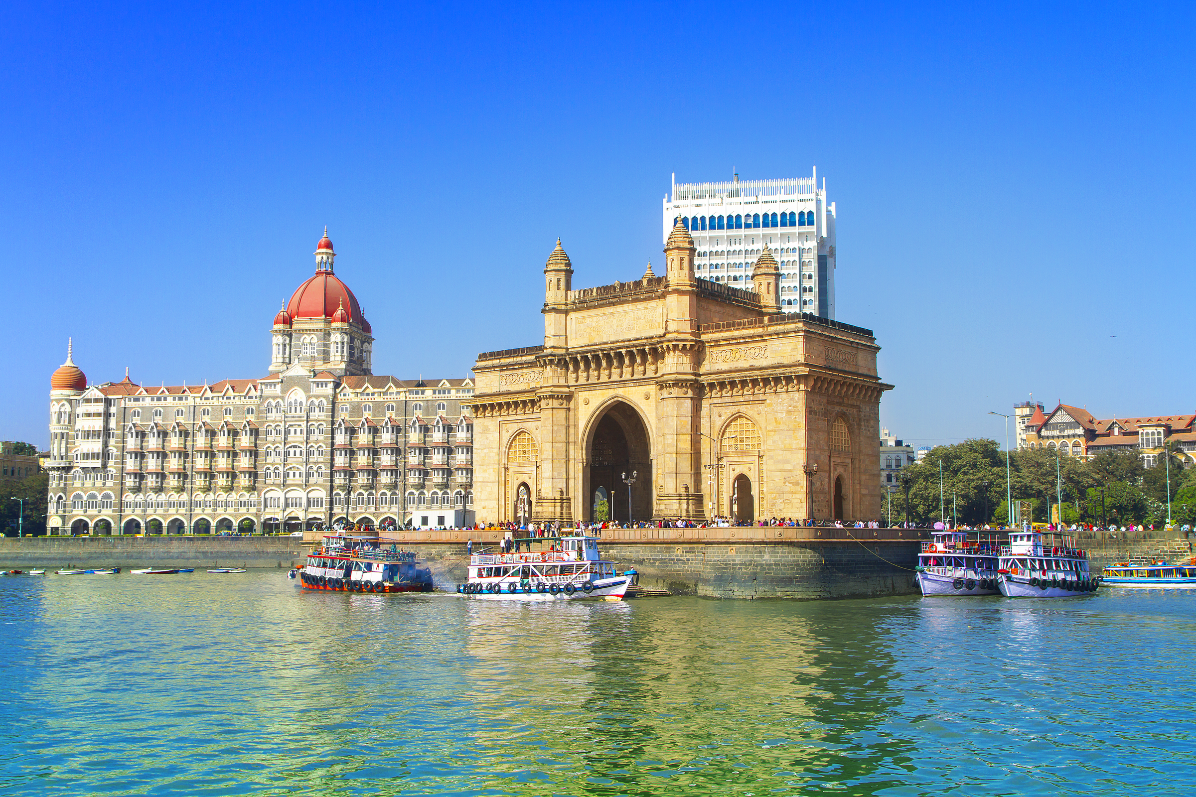 The Gateway of India and boats as seen from the Mumbai Harbour in Mumbai, India