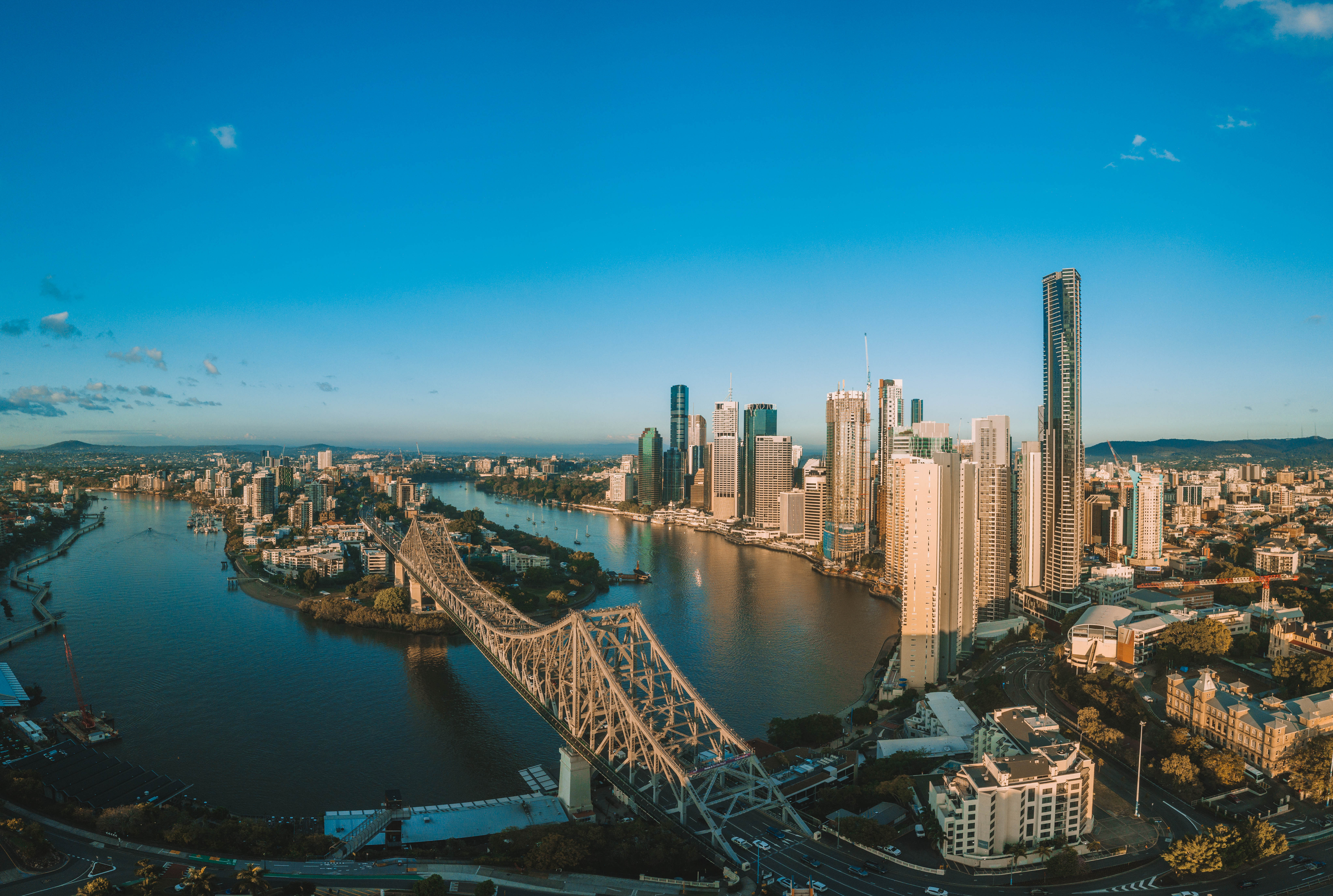 Sunrise aerial shot of Brisbane, the Story Bridge and the Brisbane River