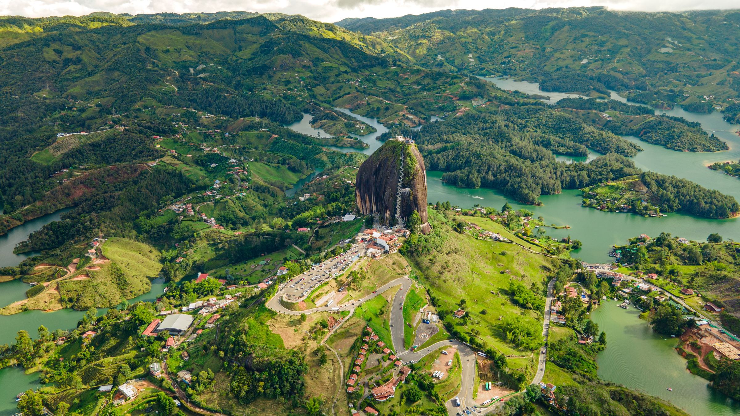 Aerial view of the Peñol stone next to the Lake or reservoir in Guatape, Antioquia, Colombia, located near the city of Medellín