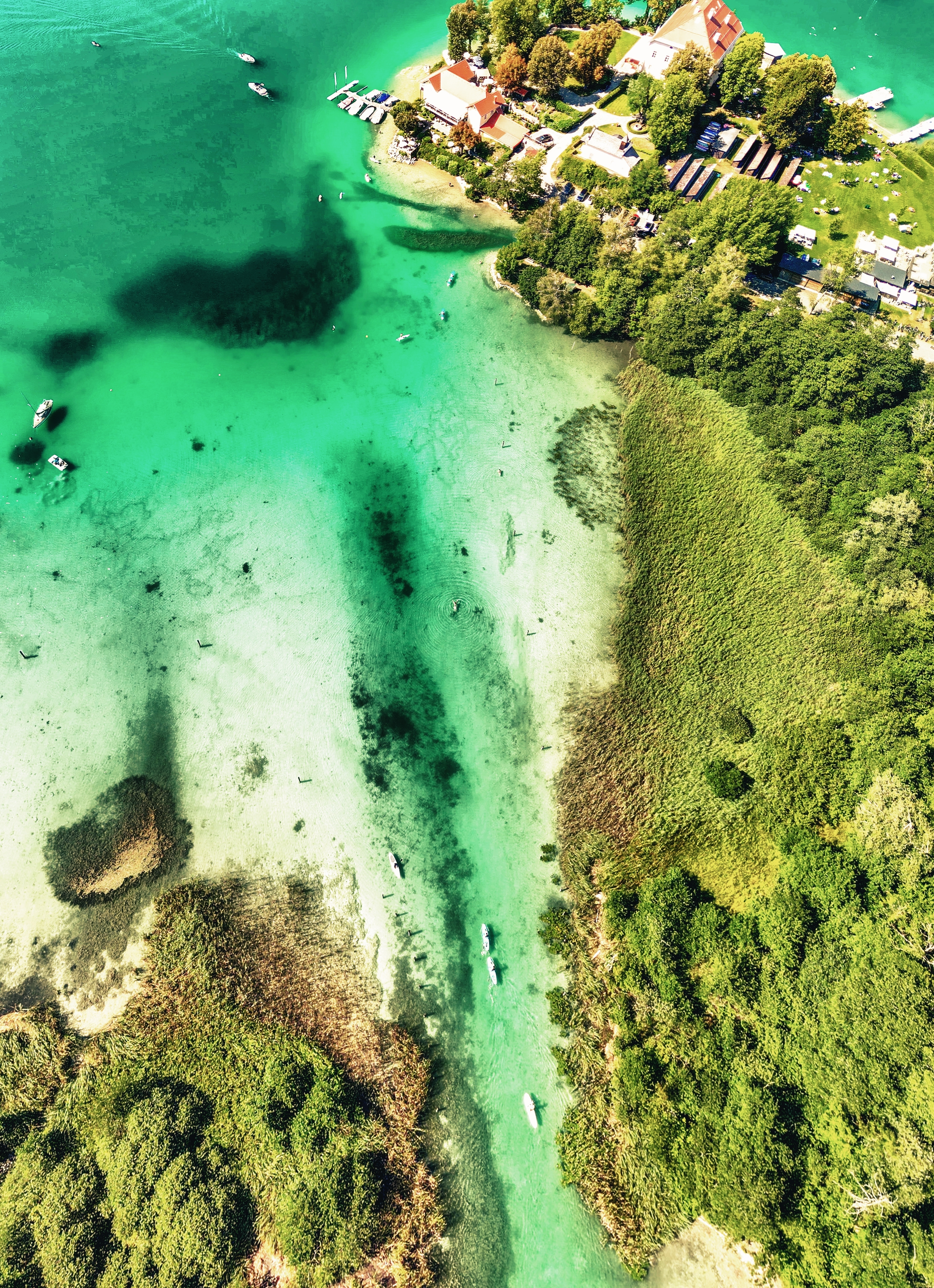 Klagenfurt Lake in summer season from drone, Austria.