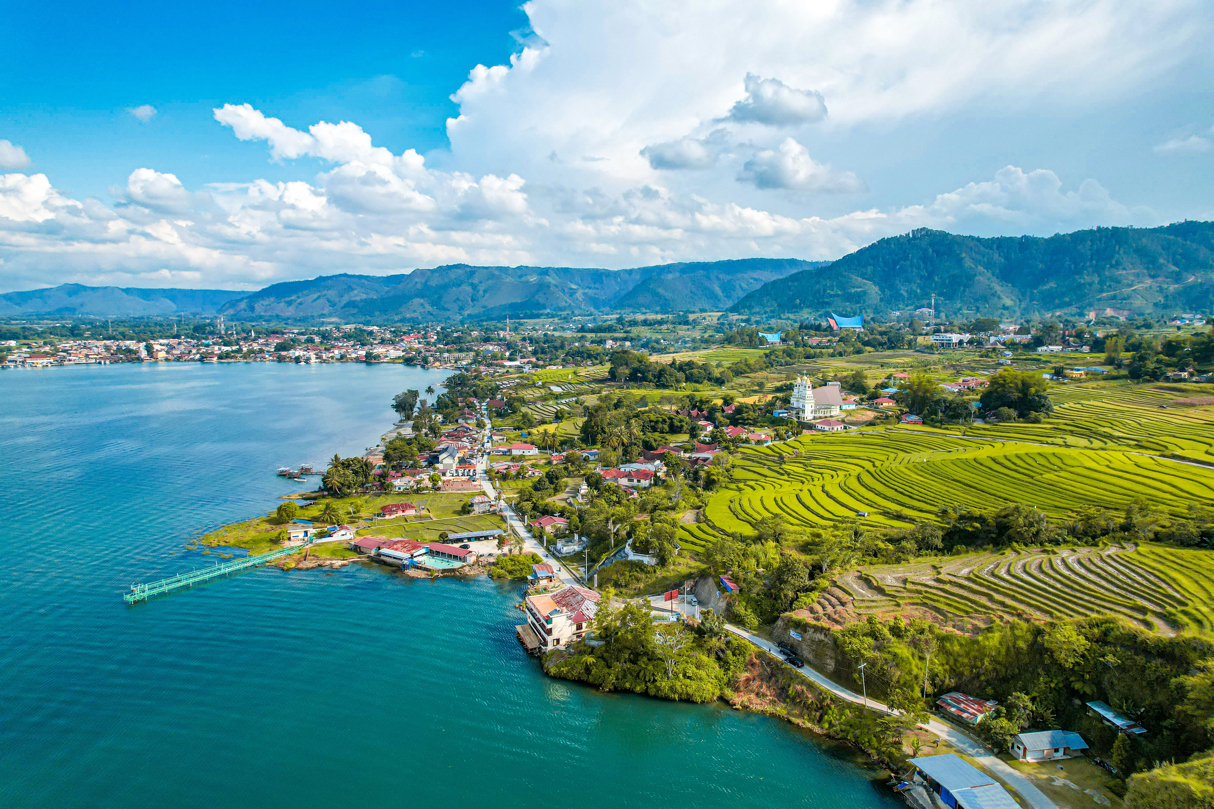 Top viewpoint over lake Toba and Samosir Island Sumatra Indonesia. Green hills highlands