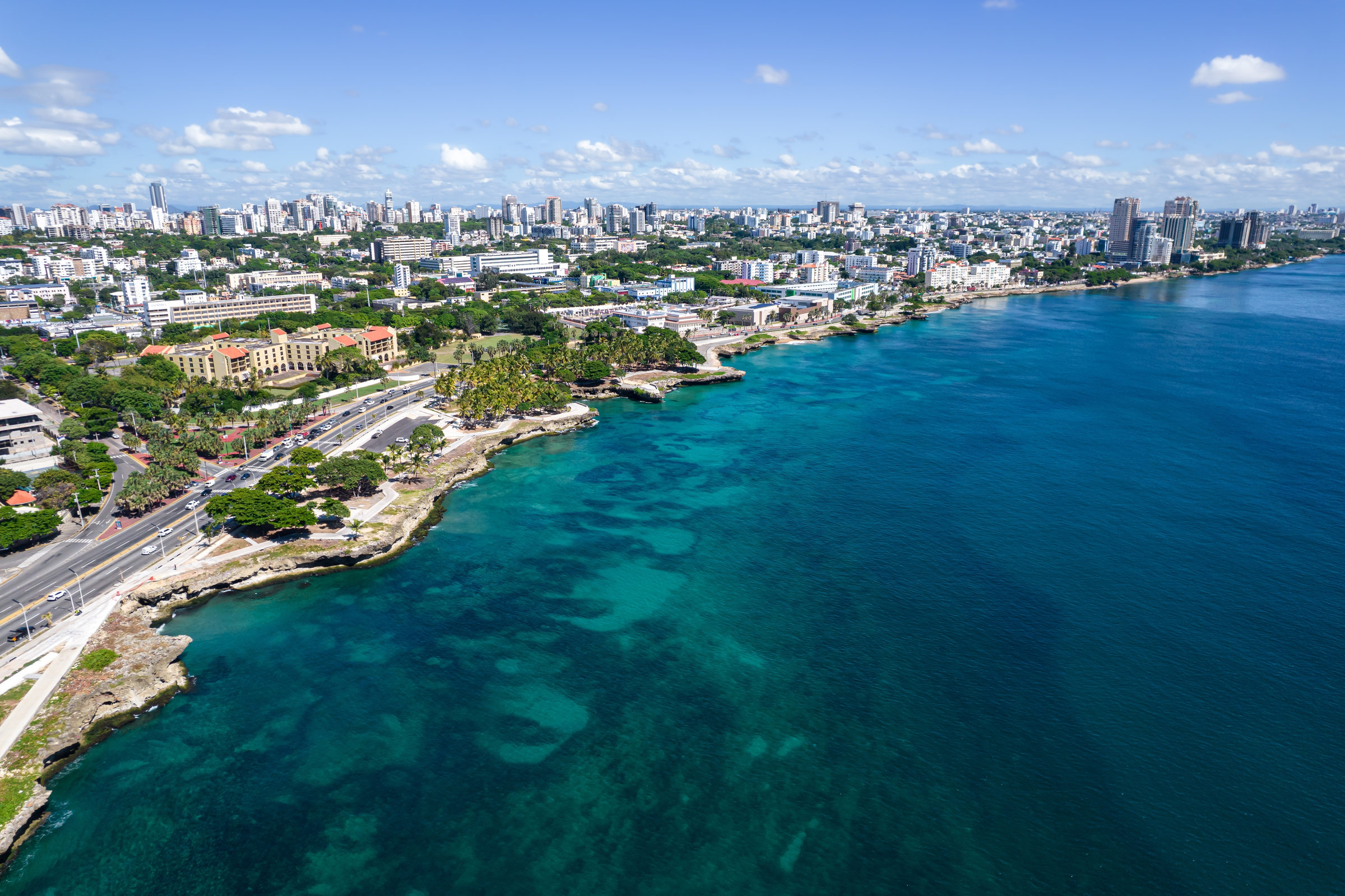 Beautiful aerial view of the city of Santo Domingo - Dominican Republic with is Parks, buildings, suburbs ,turquoise Caribbean ocean, parks and malecon