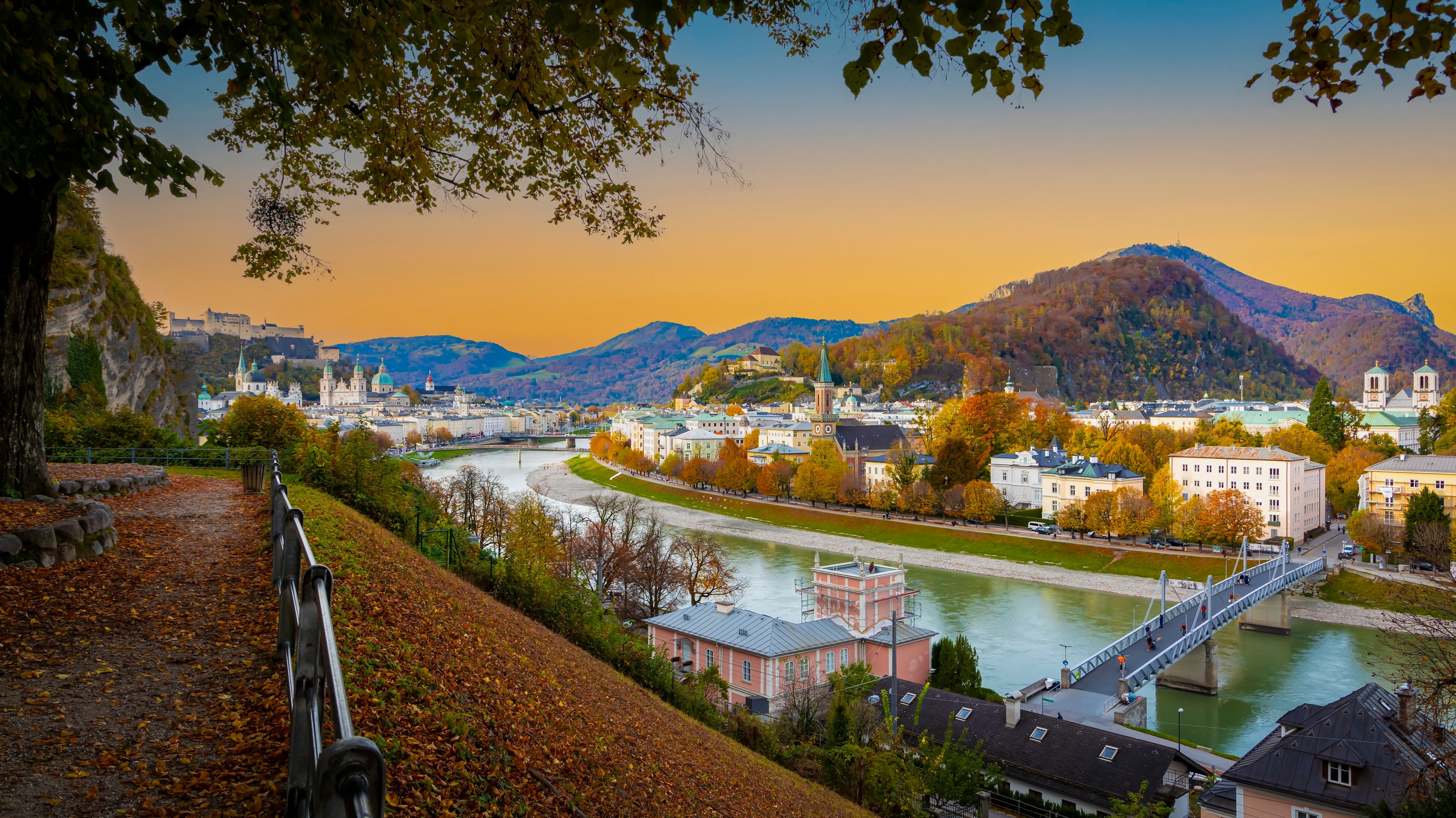 Autumn season at a historic city of Salzburg with Salzach river in beautiful sunset sky and colorful of autumn scene Salzburger Land, Austria