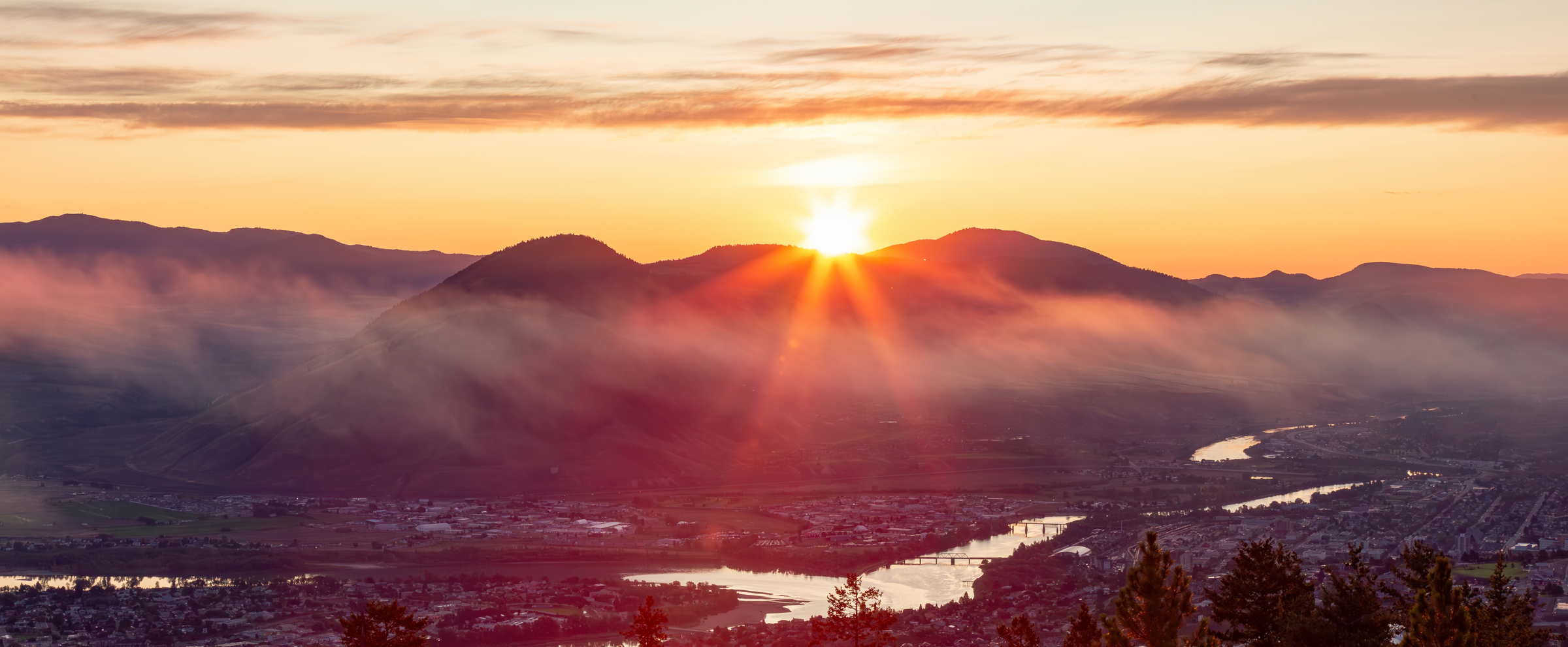 Sunrise over Kamloops, BC, Canada. Sunny Cloudy Morning.