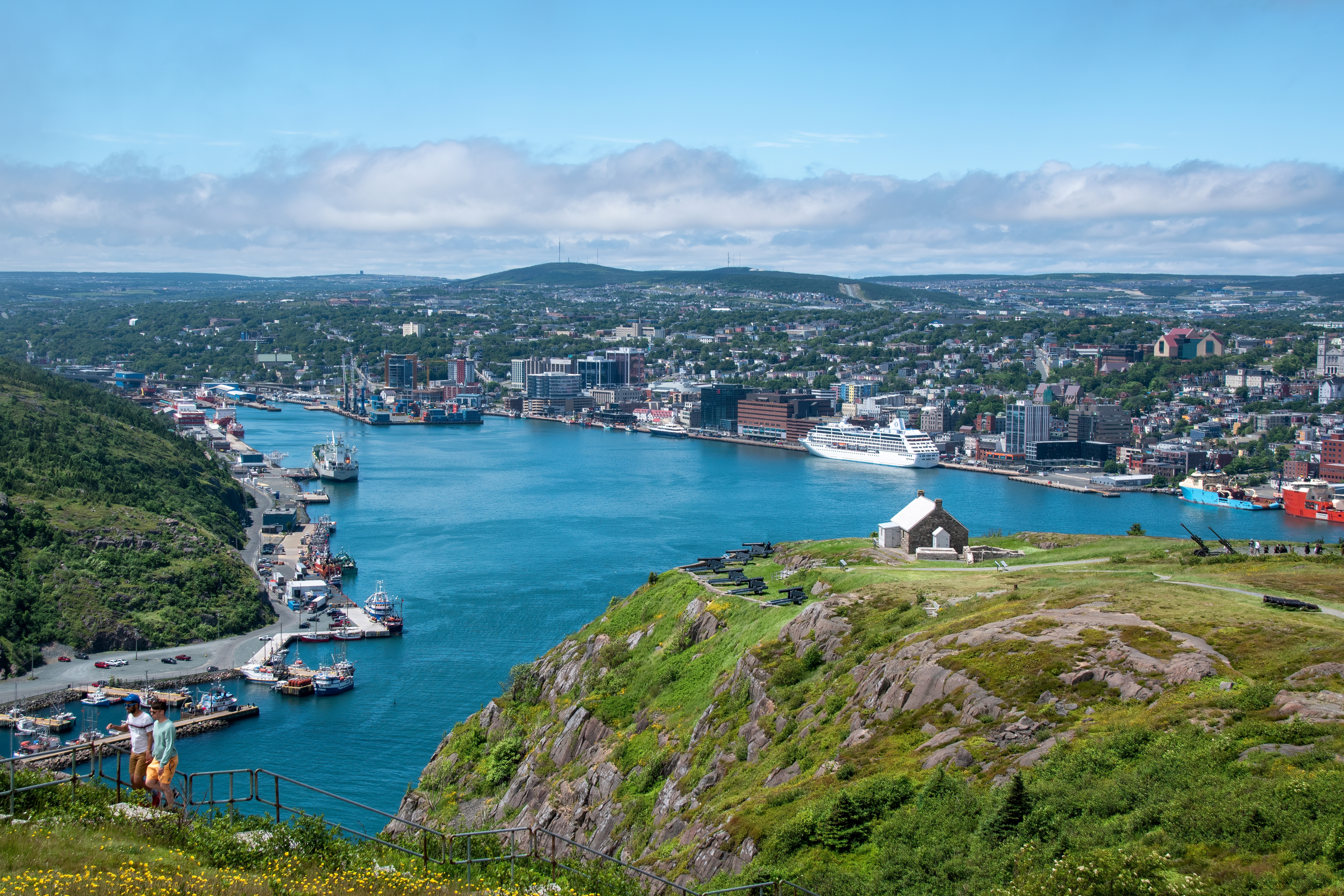 A view of St. John's harbour in Newfoundland, taken from atop Signal Hill, with the Queen's Battery in the foreground.