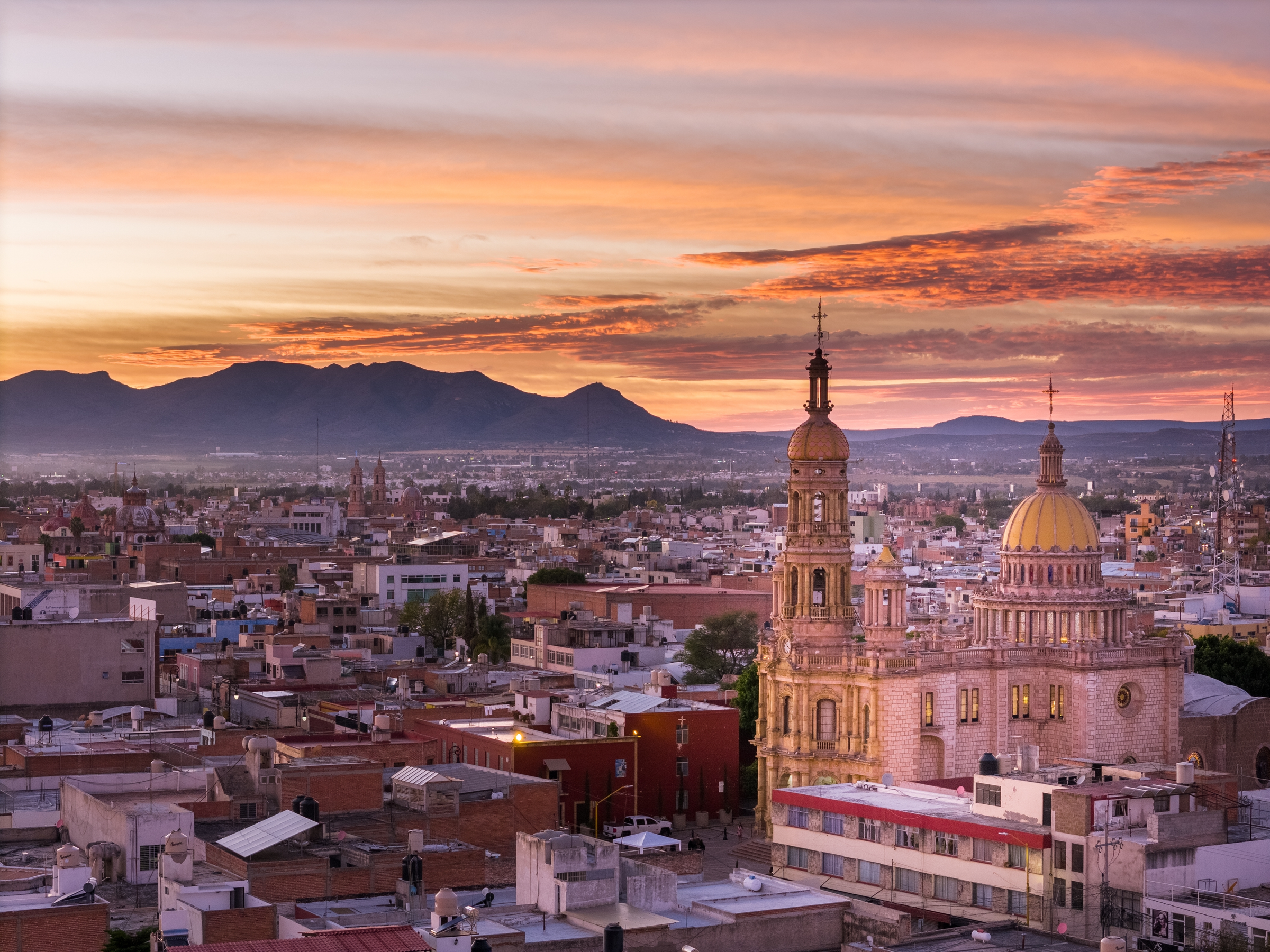 Templo San Antonio in Aguascalientes Mexico with the iconic Cerro de Muerto at sunset