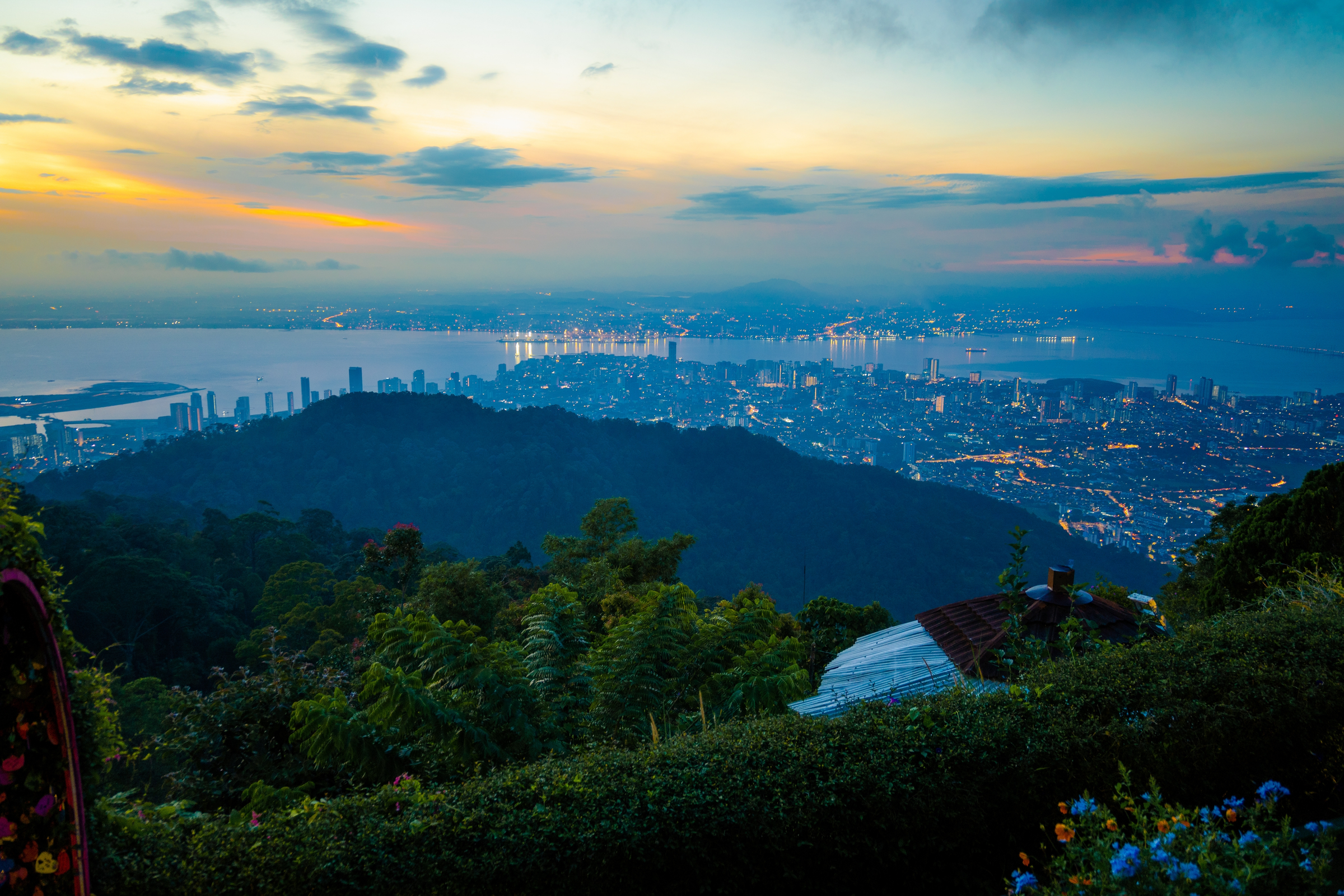 Penang Island, where the capital city, George Town, Penang Hill, beaches, history centre and many temples