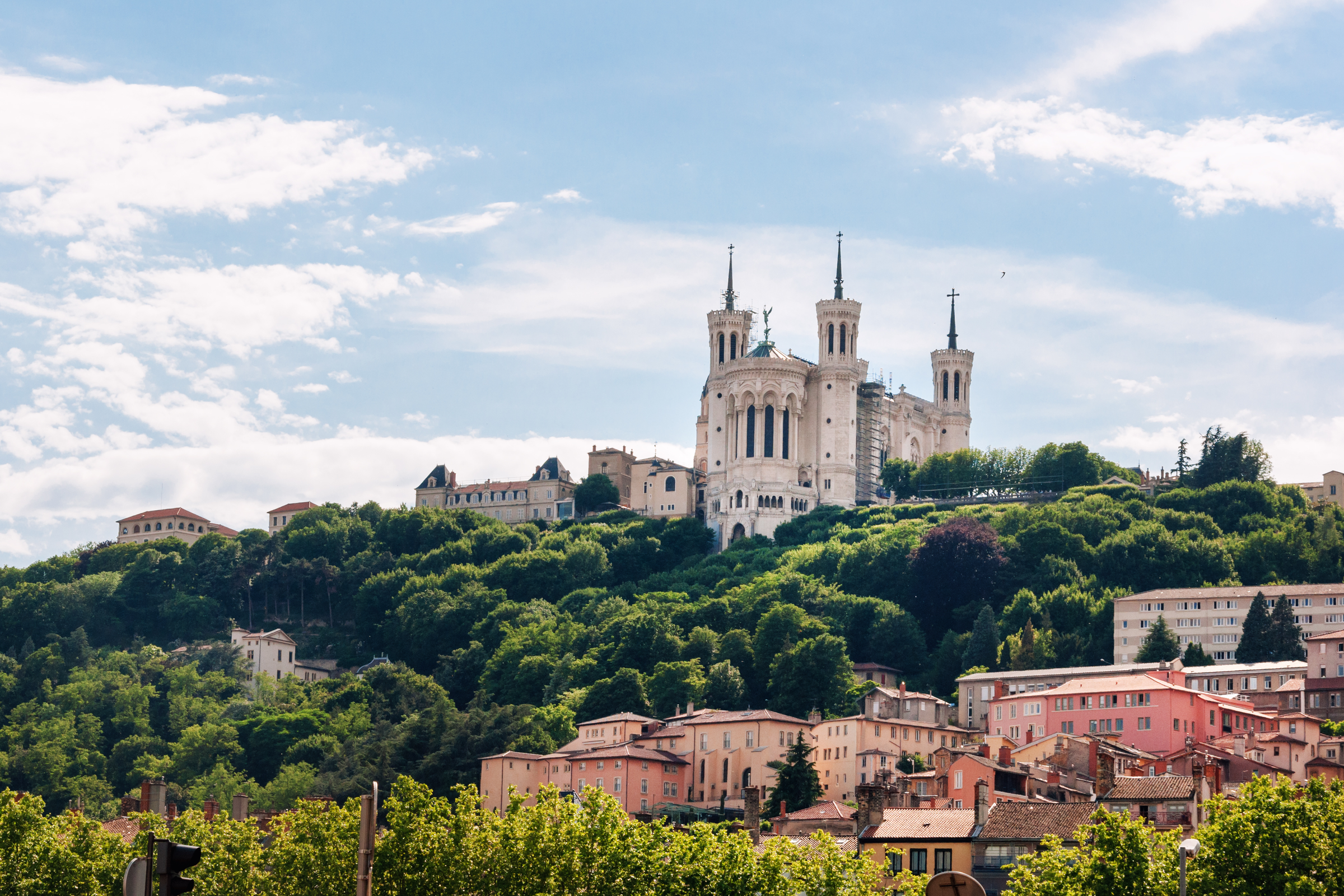 Colorful houses of Lyon and Fourviere Basilica from the Saone riverbank, France