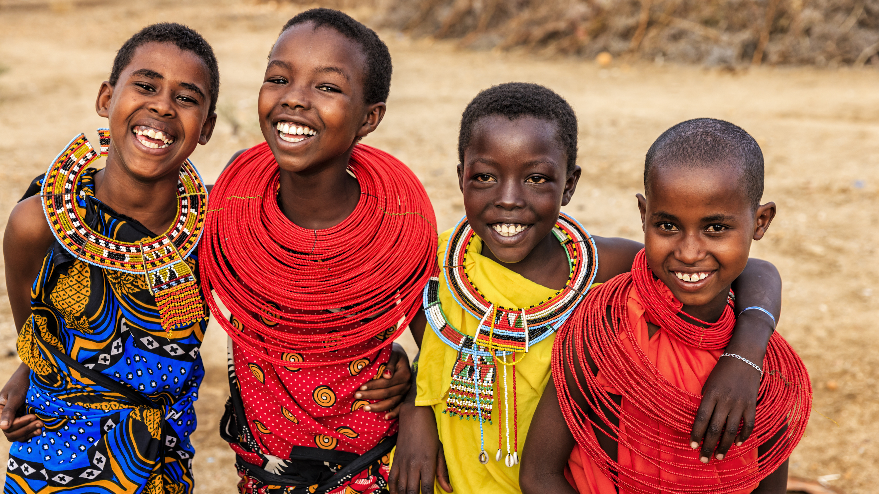 Group of happy African girls from Samburu tribe, Kenya, Africa. Samburu tribe is north-central Kenya, and they are related to  the Maasai.